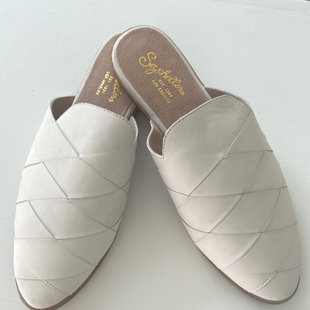White mules that are slip on with no back